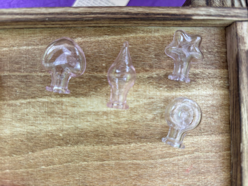 Bottles 1 per necklace or keychains.